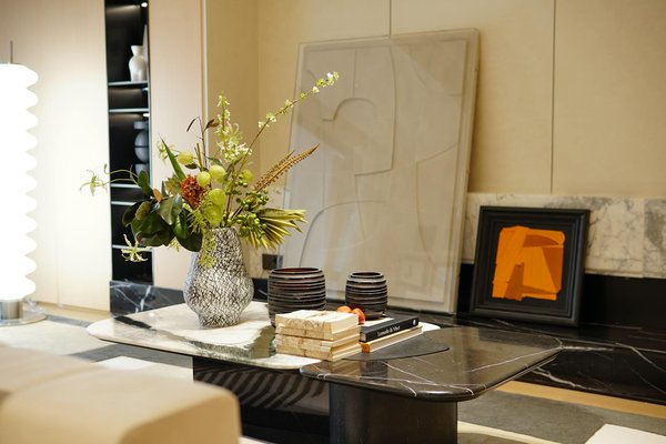 How can you create a cozy living room atmosphere?